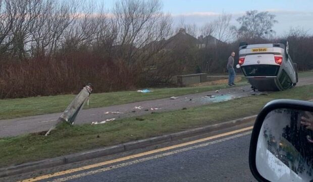 The vehicle struck a lamp post before landing on its roof. (Pic Fife Jammer Locations).