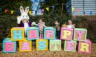 The Easter Bunny welcomes Marlie and Hunter to his grotto. Picture Steve Brown/DCTMedia.