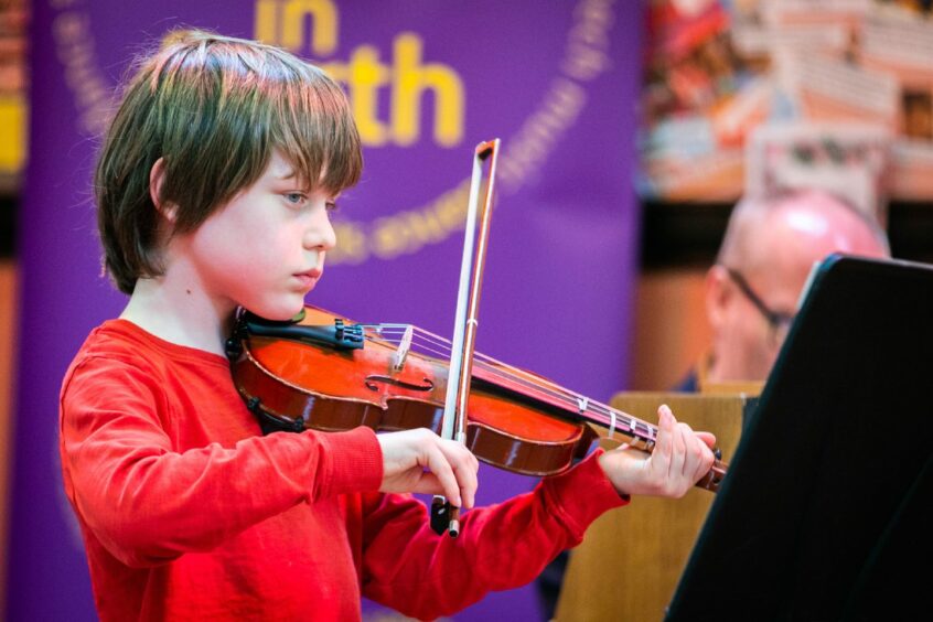 Perform in Perth pictures include Teddy Dowse-Moore of Comrie Primary School