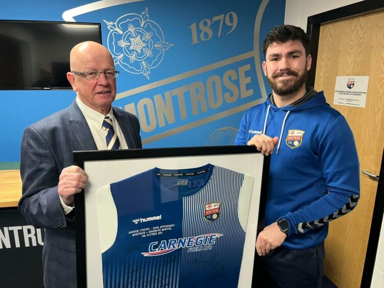 Montrose chairman John Crawford presents Andrew Steeves with his commemorative signed, framed shirt.