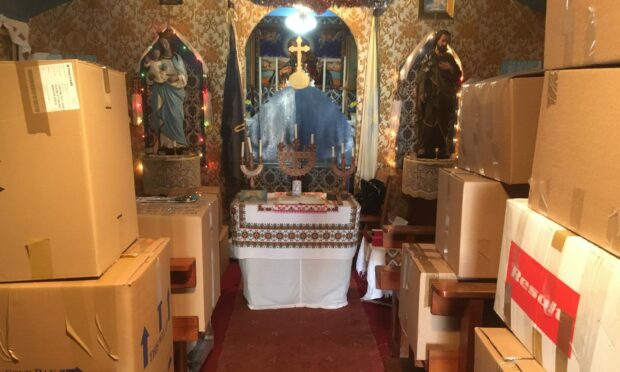 The Ukranian chapel outside Lockerbie and some of the boxes destined for Ukraine refugees