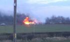 Crews spent more than 11 hours tackling a hay bales fire.