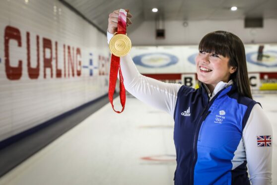 Hailey Duff with her Beijing gold medal. Pic: Mhairi Edwards/DCT Media.