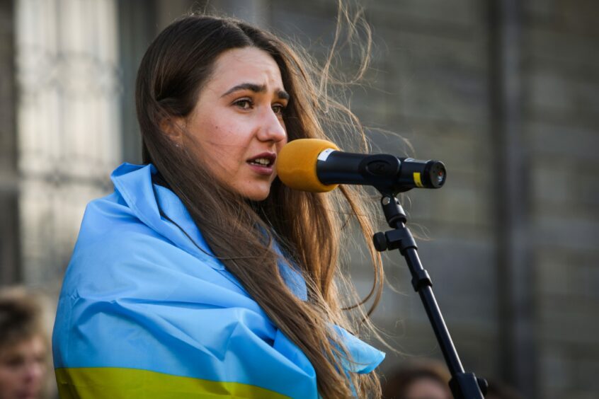 Ukrainian student Diana Surzhyk addresses the crowd during the St Andrews Ukraine rally