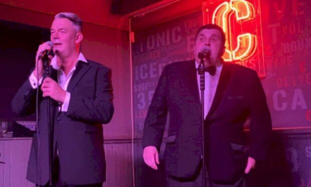 The Singing Cabbies are Jimmy Smart, left, and Wayne O'Hare.