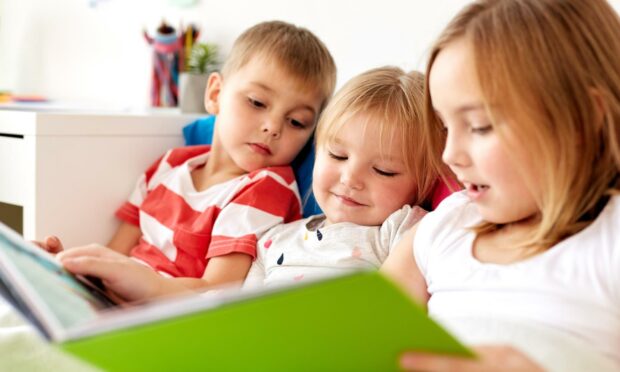 Children reading a book