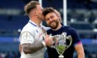 Scotland's Stuart Hogg and Ali Price celebrate with the Cuttitta Cup
after the win over Italy.