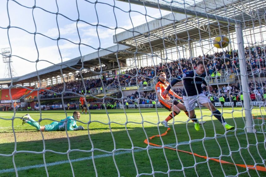 Danny Mullen nods in from close range against United.