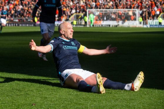 Charlie Adam celebrates his goal at Tannadice.