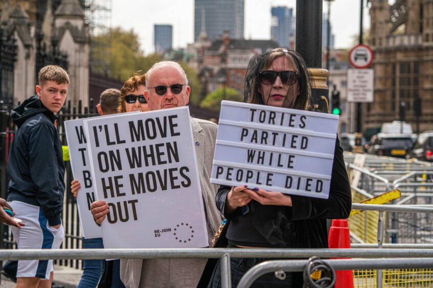 Protesters demanding the resignation of Boris Johnson over Partygate
