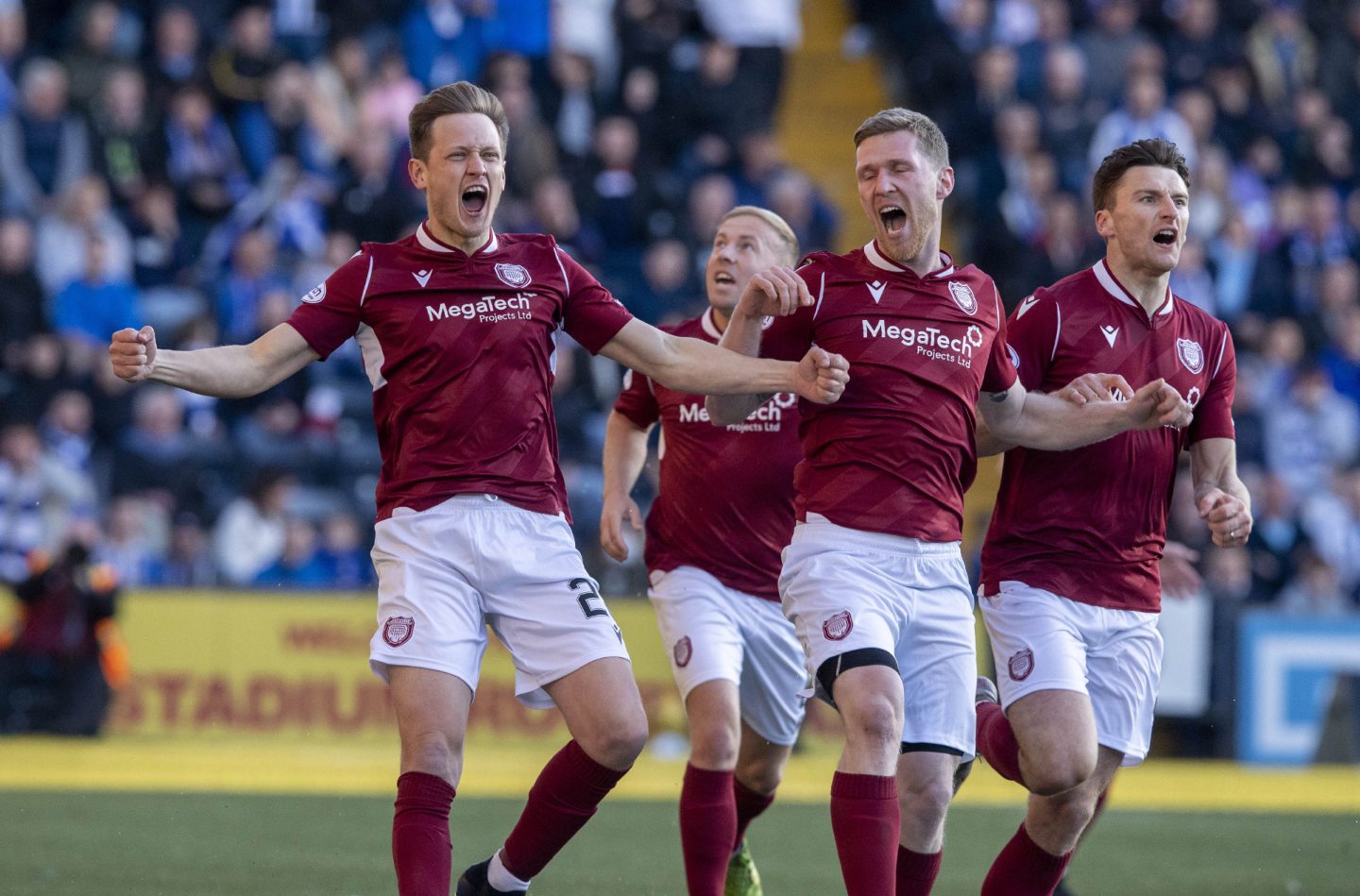James Craigen and his Arbroath teammates celebrate after shocking Kimlarnock with an early goal on the penultimate game of the season.