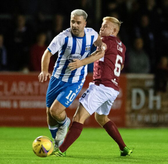 Nicky Low in action against Kilmarnock earlier in the season.
