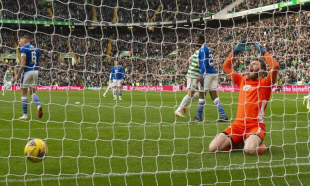 Frustration: Clark concedes at Celtic Park