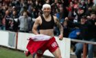 A delirious Matej Poplatnik celebrates after Raith Rovers' SPFL Trust Trophy win