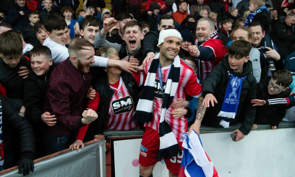 Poplatnik with adoring Rovers' fans