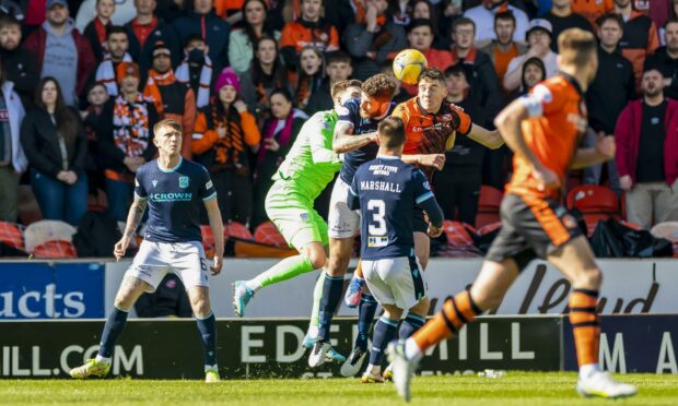 Players clash in the recent Dundee derby