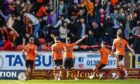 Nicky Clark celebrates his opening goal against Dundee