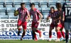 Shaun Rooney celebrates his equaliser.