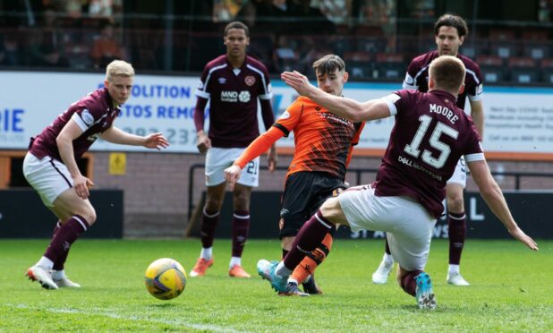 Dylan Levitt scores against Hearts last season.