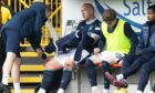 Dundee skipper Charlie Adam cuts a frustrated figure after being subbed.