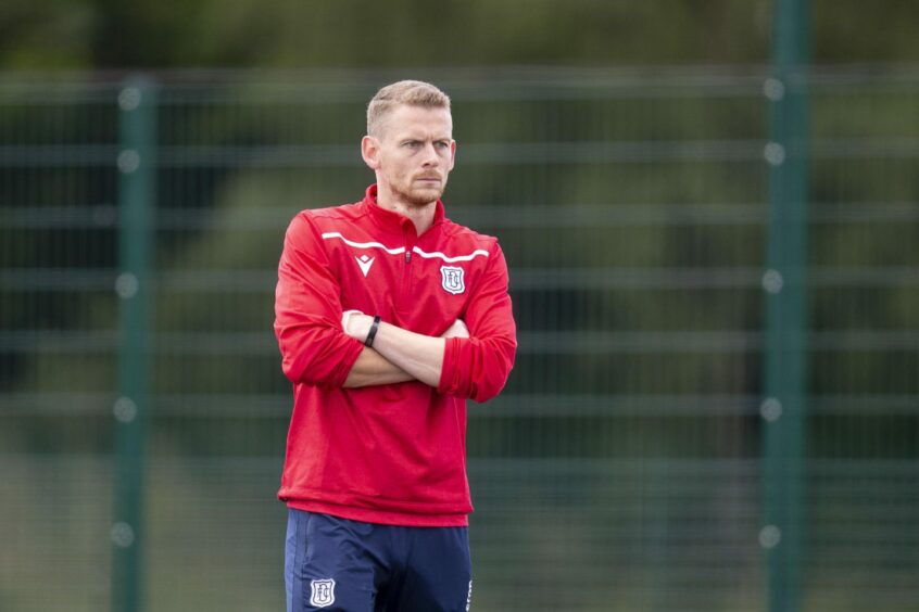 Scott Robertson watches training at Dundee FC