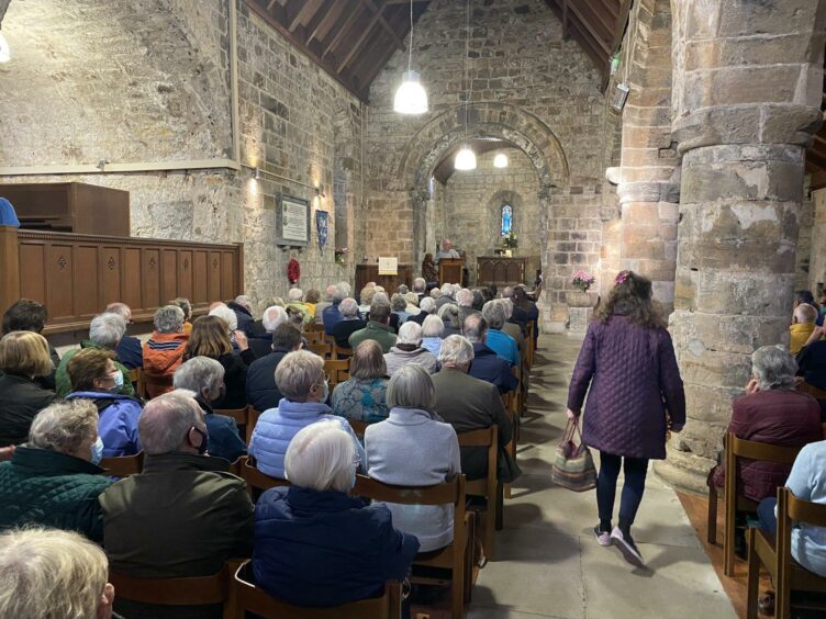 Residents discussing the future of St Fillan's Church.