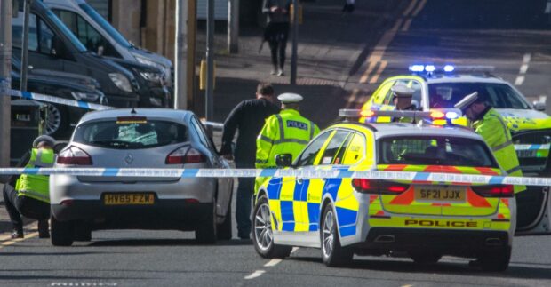 Police closed the road for over two hours. (Pic Marcus Tyler).