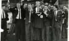 Dundee celebrate after beating St Johnstone 3-0 at Muirton Park, Perth, to win the League Championship in 1962.