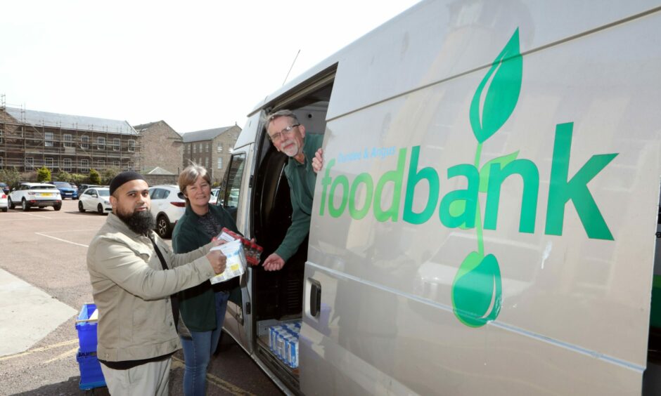 Items being loaded into the foodbank van.