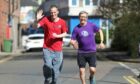 Eagles Wings charity founder Mike Cordiner is preparing for an ultra-marathon, training with service user David Smith.