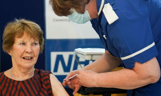 Margaret Keenan, 92, receives her spring Covid-19 booster shot at University Hospital Coventry. Mrs Keenan, known as Maggie, was the first patient in the United Kingdom to receive the Pfizer/BioNtech Covid-19 vaccine. Picture via PA.