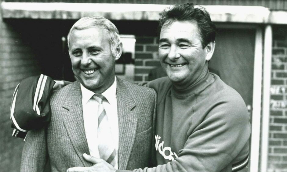The two managerial legends side by side.