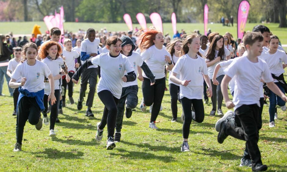 Hundreds of Dundee pupils descended on Baxter Park to help celebrate the 10th birthday of The Daily Mile.
