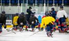 Omar Pacha gives his Dundee Stars instructions on their final training session before leaving for Nottingham.
