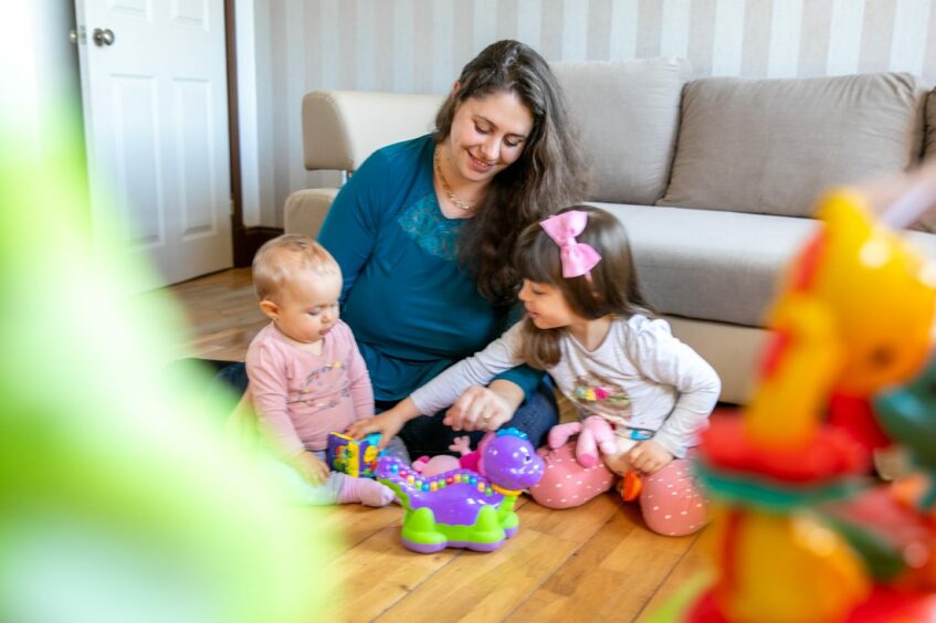 Haristina Georgieva with her daughters Anna and Valentina.