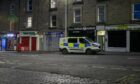Police on Rosefield Street in Dundee following an unexplained death