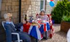 Boris Johnston enjoys tea with the Queen at Elie Scarecrow Festival. All pictures Kenny Smith/DCT Media.