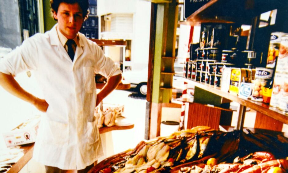 Iain Campbell pictured many years ago with some produce for sale.