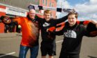 Divided loyalties - Paul Simpson with sons Ross (15) a Dundee fan and Adam (17) a United fan like his dad.