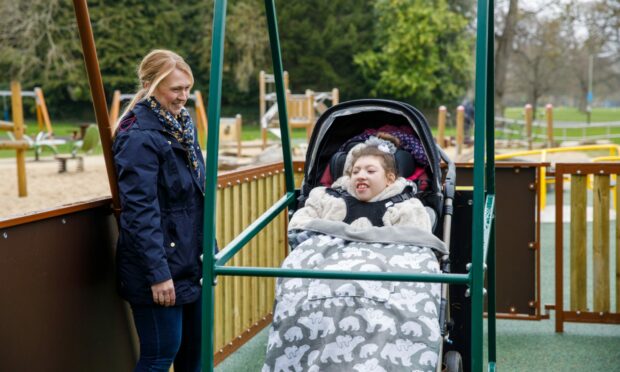 Maisie and mum, Claire, enjoying her new swing.