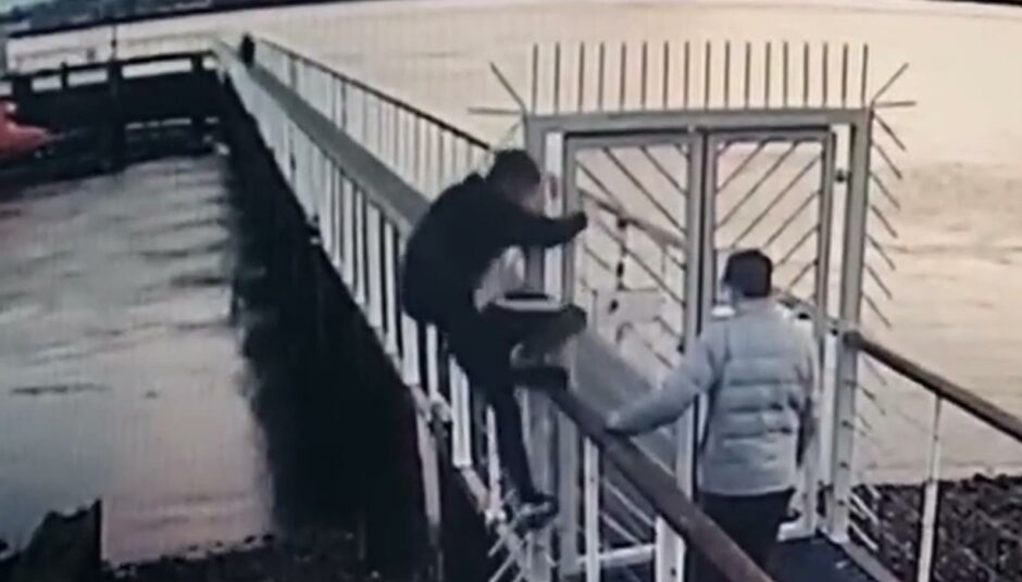 CCTV footage shows the youths climbing the security fence at Broughty Ferry lifeboat station.