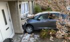 The car crashed into the front of the house in Cowdenbeath.