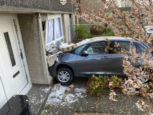 The car crashed into the front of the house in Cowdenbeath.