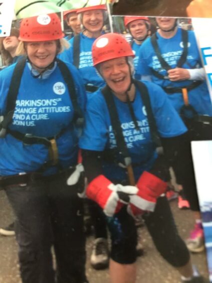 Doreen (left) and sister, Anne, abseiled off the Forth Rail Bridge to raise money for Parkinson's UK.