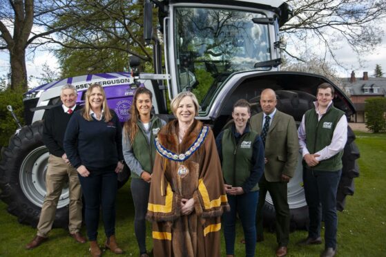 Worshipful Company of Farmers Master, Karen Mercer, centre, joins representatives from the NFU, Massey Ferguson and KO Machines to unveil the special tractor.