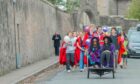 Dr Leyla Hussein OBE took part in the traditional drag through St Andrews.