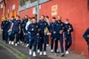 Dundee players and staff walk to Tannadice earlier this season.