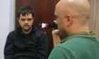 A still from the video of Graham Phillips interviewing captive Aiden Aslin. Supplied by YouTube; Date Unknown