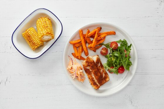 Cod peri-peri with sweetcorn, coleslaw and sweet potato fries.