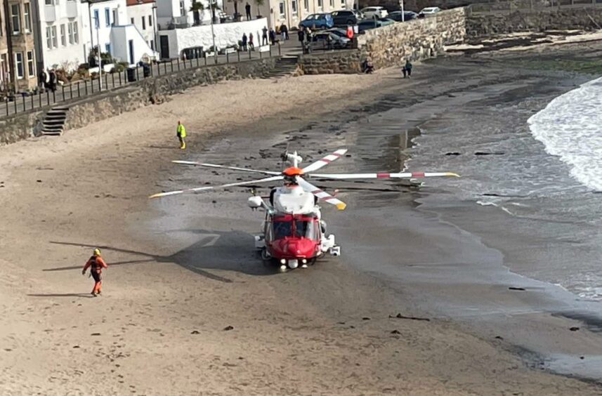A coastguard helicopter at the scene of the incident. 